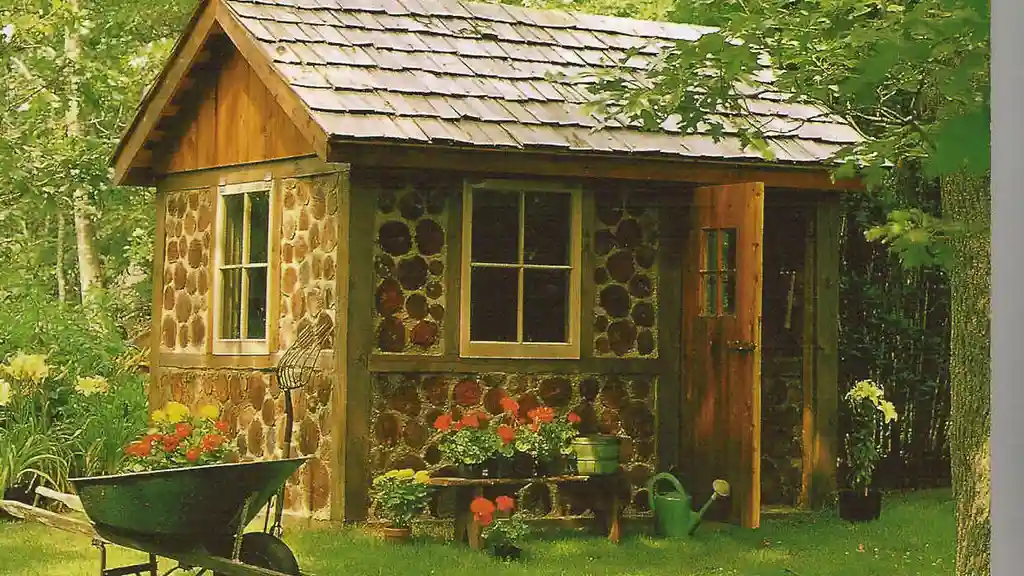 Close up on a plate of mashed potatoes, topped with baked pork chops with cream of mushroom soup, and a side of green beans.